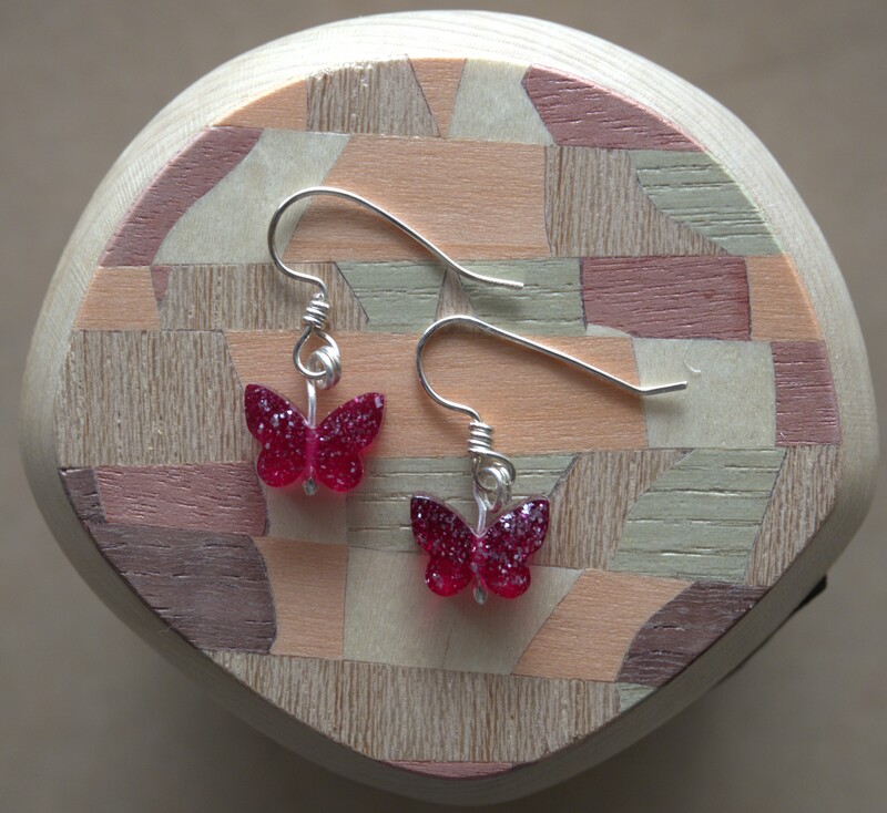 Garnet colored butterfly shaped handmade argentium and fine silver sweetheart earrings
