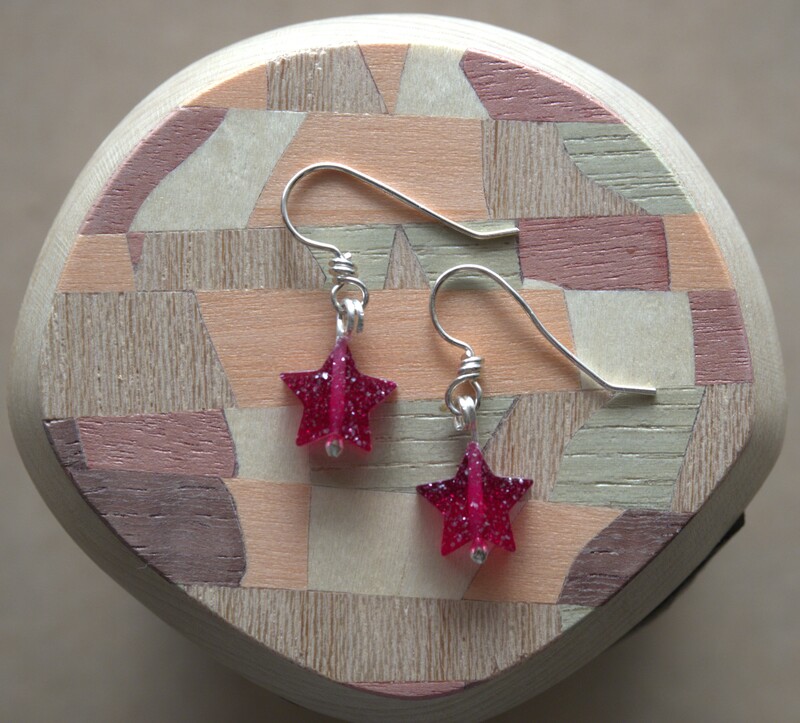 Garnet colored and star shaped handmade argentium and fine silver sweetheart earrings